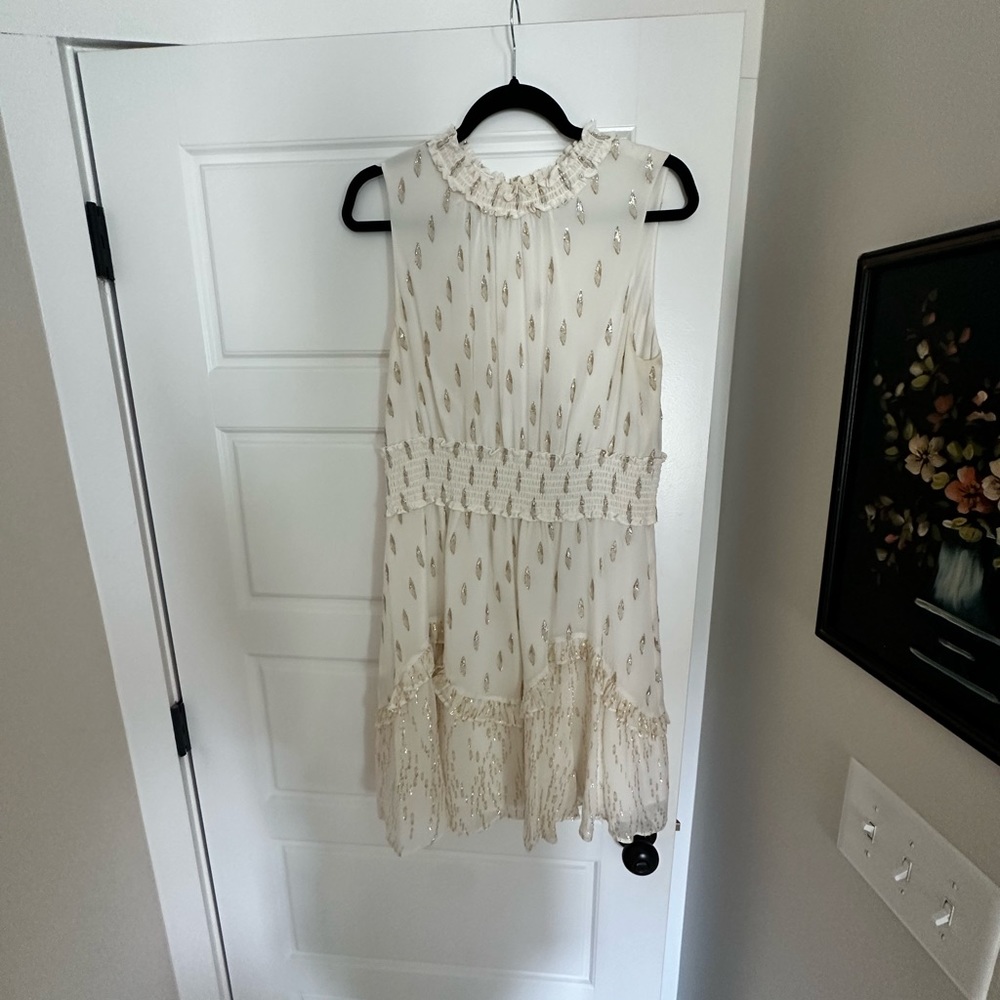 A Loves A Dillard’s White Halter dress with Gold & Silver Detailing